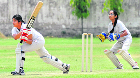 A member of the Sacred Heart School team plays a shot in a match against IS Dev Samaj School at the LIC ground in Sector 26, Chandigarh, on Sunday.