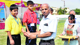Special children being awarded during the concluding day of the Special State-level Olympic Sports Championship in Haridwar on Sunday.