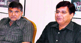 Food and Civil Supplies Minister Pritam Singh, along with former Minister Sanjay Paliwal, at Damkoti in Haridwar on Sunday.