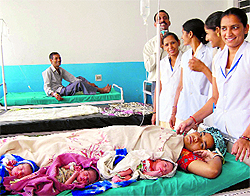 Manju Devi with her newborn triplets at a hospital in Mahendragarh