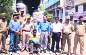 Officials of the Kathua police and Excise Department with the consignment of polythene at Lakhanpur