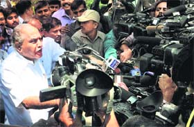 Karnataka ex-CM BS Yeddyurappa speaks to the media outside his Bangalore residence