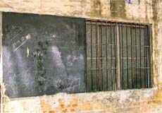 Poor condition of a blackboard in a government