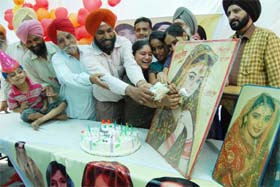 Happy birthday dhak dhak girl Fans of Bollywood super star Madhuri Dixit celebrate her 44th birthday in Amritsar on Monday