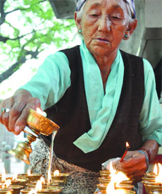 Tibetans light up diyas in memory of their martyrs in New Delhi on Monday. 