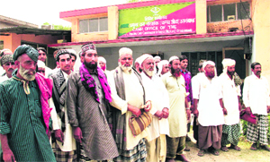 Van Gujjars from the Kalagarh Tiger Reserve in front of the office of the Uttarakhand Chief Wildlife Warden to submit a memorandum in support of their demands in Dehradun on Monday.