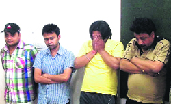 The bookies in police custody in Mussoorie on Monday.