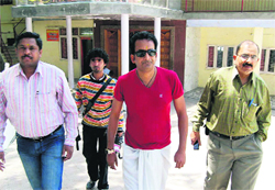 Film personality Hemant Pandey walks towards a temple in Mussoorie on Monday