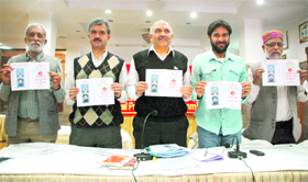 CPM members with their manifesto in Shimla on Monday.