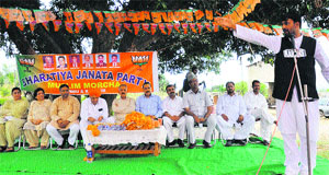 A BJP leader addresses a public rally in the Sunjawan area of Jammu on Sunday.  