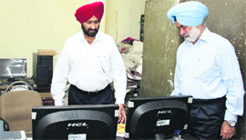 State Transport Commissioner Harjeet Singh during his surprise visit to DTO office in Jalandhar.