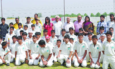 Students of various schools pose for a photograph before the inauguration of the Inter-school Cricket Tournament 2012 at Little Blossom School in Jalandhar on Monday.