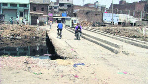 A bridge sans a boundary wall near Gau Ghatt area in Ward No. 20, Ludhiana.