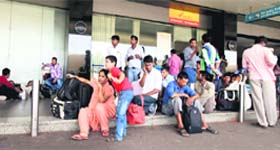 NEVER-ENDING WAIT: Passengers outside the Kolkata Airport as the Air India strike entered its seventh day on Monday