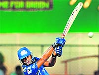 Mumbai Indians Ambatti Rayadu hits a boundary during their match against Royal Challengers Bangalore at the M. Chinnaswamy Stadium in Bangalore on Monday. Mumbai Indians won by five wickets.