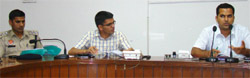 Deputy Commissioner-cum-chairman of operation and maintenance society Kamal Kishore Yadav addressing a meeting at the Mini-secretariat in Bathinda on Tuesday. A Tribune Photograph