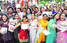 Students in a happy mood at the prize distribution function at State Institute of Education, Sector 32, Chandigarh, on Tuesday