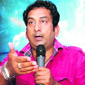 Hemant Pandey, a television artiste, addresses a press conference in Dehradun on Tuesday