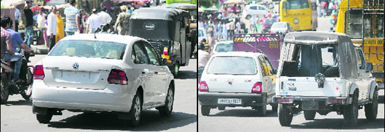 In the absence of tamper-proof number plates in the state, some vehicles ply without number plates. Here, a private car and (right) a government gypsy are seen without number plates in Jammu.