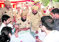 A policeman being examined at a medical camp organised by the Government Railway Police in Jammu on Tuesday