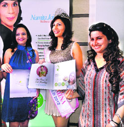 Femina Miss India World 2012 Vanya Mishra (left) at the opening of a clinic in Jalandhar on Tuesday. 