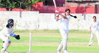 A player executes a shot during the LIC cricket tourney in Chandigarh. tribune photo: Manoj Mahajan
