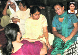 Anubhav Kalias (inset) mother and other relatives mourn at her house at Sector 69 in Mohali on Wednesday. Tribune Photo: Vicky Gharu