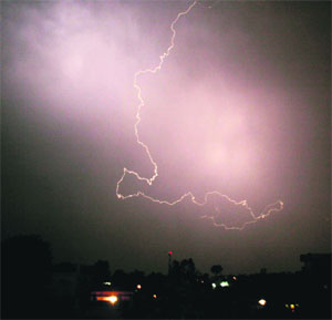 Sudden lightning adds spark to the overcast sky in Jammu on Tuesday night.