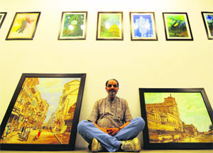 Artist Vijay Kumar Thapar with his creations at the Artmosphere Gallery in Ludhiana. 
