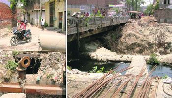 A caved-in portion of a road can lead to a fatal mishap at Ward No. 21 in Ludhiana. (right) A bridge under construction in the area.