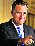 US Republican presidential hopeful Mitt Romney gestures to supporters in Iowa