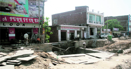 Dangerous trenches pose a threat to commuters in Jammu.