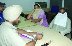 Chiranji Lal and his wife Jasbir Kaur at the NRI police station in Jalandhar on Thursday.