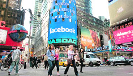 A monitor shows a welcoming message for Facebook's listing on the Nasdaq market site prior to the opening bell in New York City on Friday. Facebook Inc began trading on the Nasdaq with it's initial public offering at $38 per share, valuing the world's largest and most popular social networking website at more than US $100 billion.