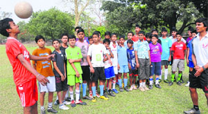 Football players take part in a coaching camp at the Sector 17 stadium on Friday. 