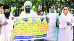 Family members of Jagtar Singh Hawara outside the Chandgiarh police headquarters at Sector 9 in Chandigarh on Friday. 