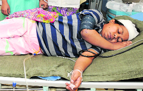 Narayani, the injured PhD scholar from Sri Lanka, under treatment at a private nursing home in Karnal on Friday.