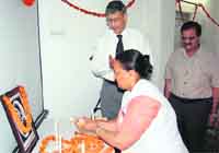 A nurse lights candles to open the concluding function of International Nurses Week at the Tanda Medical College on Friday. Photo: Ashok Raina