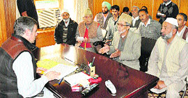 Chief Minister Omar Abdullah interacts with a delegation of locals during awami mulaqat.