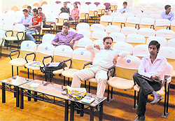 Students wait for their turn during the second day of campus recruitment by Wipro at Jammu University on Friday