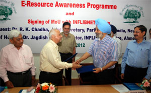 The Vice-chancellor of the Central University of Punjab, Prof Jai Rup Singh, and the director of INFLIBNET Centre, Jagdish Arora, greet each other after signing a memorandum of understanding on the universitys city campus in Bathinda on Saturday. 