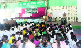 Students of Delhi Public School attend a workshop on Traffic etiquette, awareness" during their summer camp in Dehradun on Saturday