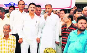 Rashtriya Krantikari Manch founder Ambrish Kumar protests in front of the offce of the District Food and Supply Officer in Haridwar on Saturday