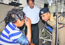 SSP Shashank Anand meets Narayani at a private nursing home in Karnal on Saturday. 