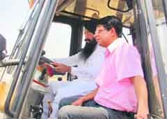 PWD Minister Sharanjit Dhillon and Ludhiana DC Rahul Tiwari launch an anti-encroachment drive. Tribune photo