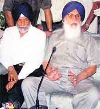 Chief Minister Parkash Singh Badal and Rural Development Minister Surjit Singh Rakhra at Rakhra in Patiala on Saturday. Tribune photo: Rajesh Sachar