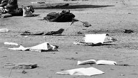 School books lay scattered on the ground after a blast near a school in Brindisi on Saturday.