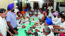 Depot holders from across the Punjab holding a meeting in connection with their several demands, including salary and carriage charges, in Bathinda on Sunday. The depot holders are on an indefinite strike for nearly two months