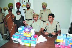 Police arrested two persons in theft case present before media during a press conference in at Civil Lines police station in Bathinda on Sunday. 