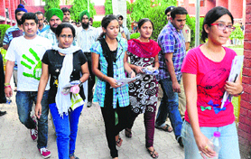 Candidates come out of the examination hall at Government Model School, Sector 19, Chandigarh, after appearing in the UPSC preliminary exam